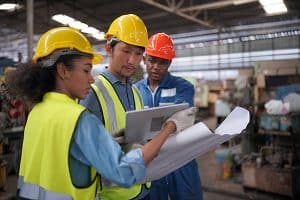 Engineers Discussing Pre-Startup Safety Review Report