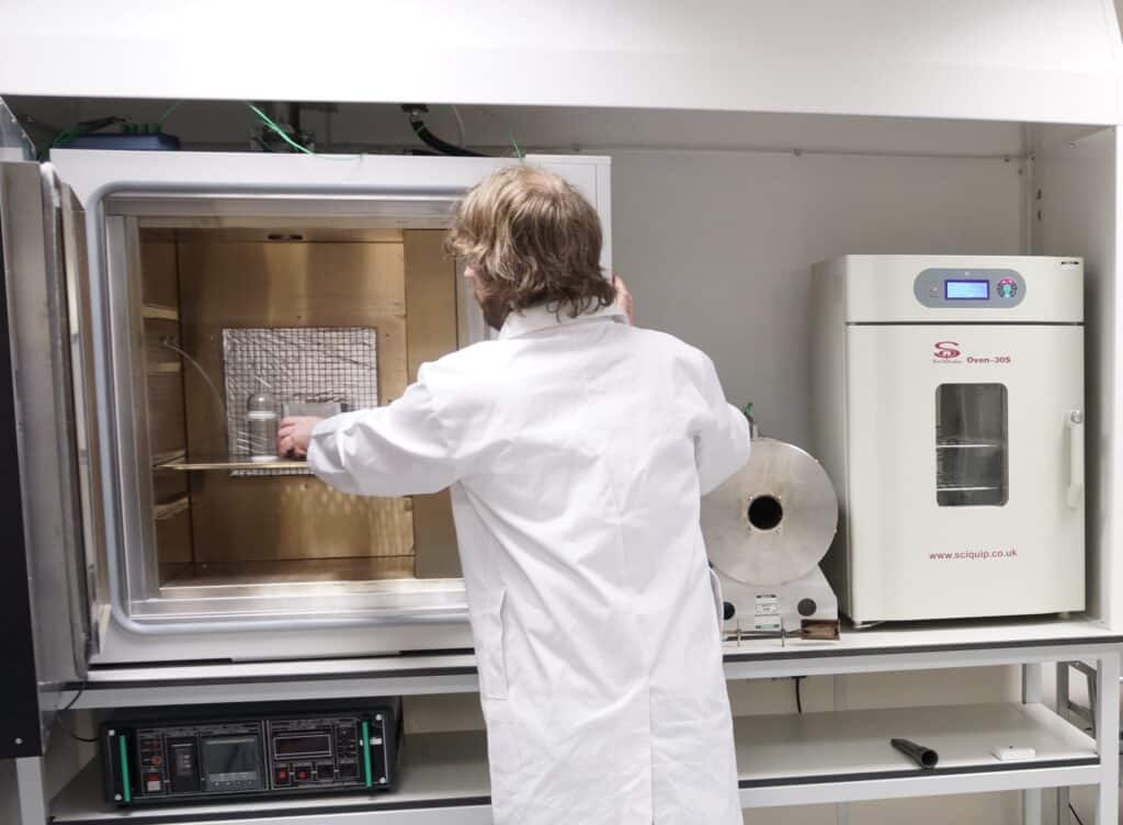Man in White Coat in Laboratory Process Safety Testing