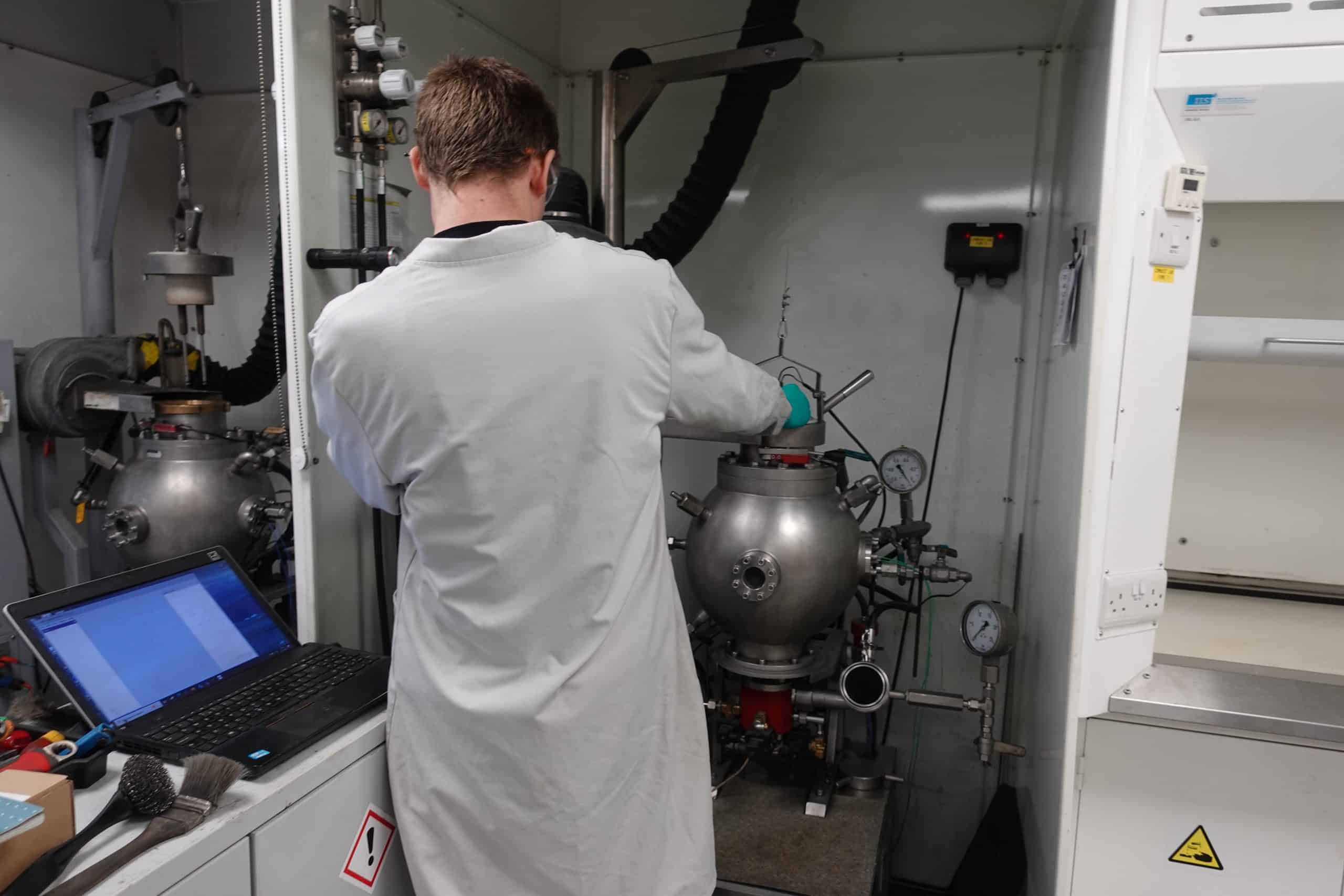 lab technician at a machine