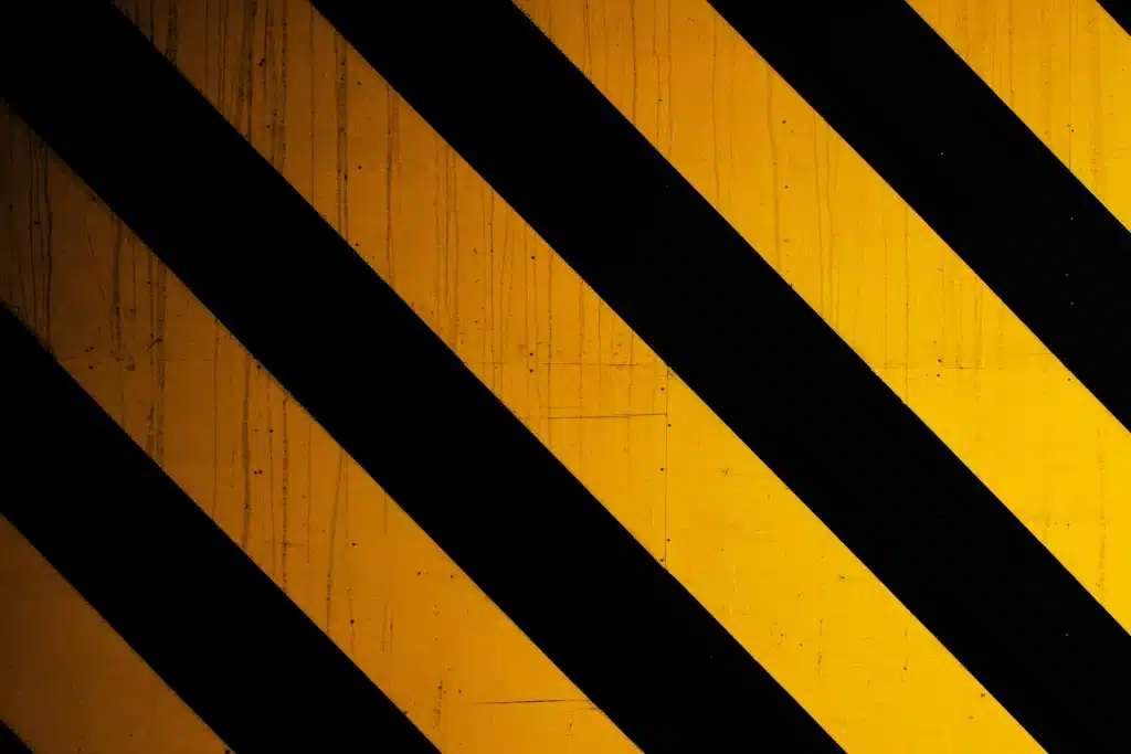 black and yellow stripped area