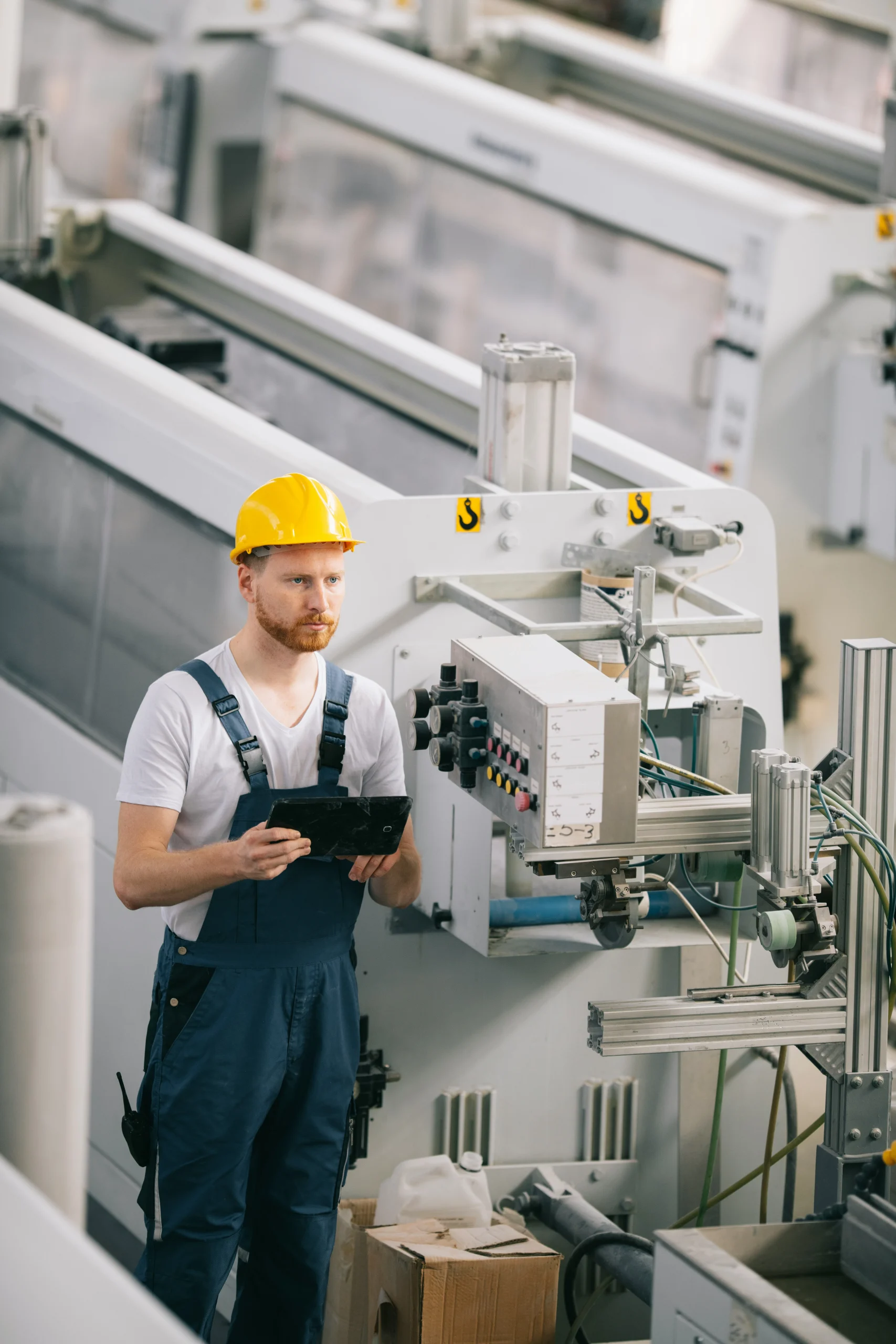 Process safety engineer reviewing ATEX compliance documentation on site