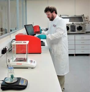 lab technician using dsc machine