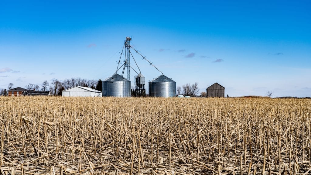 silos against blue sky