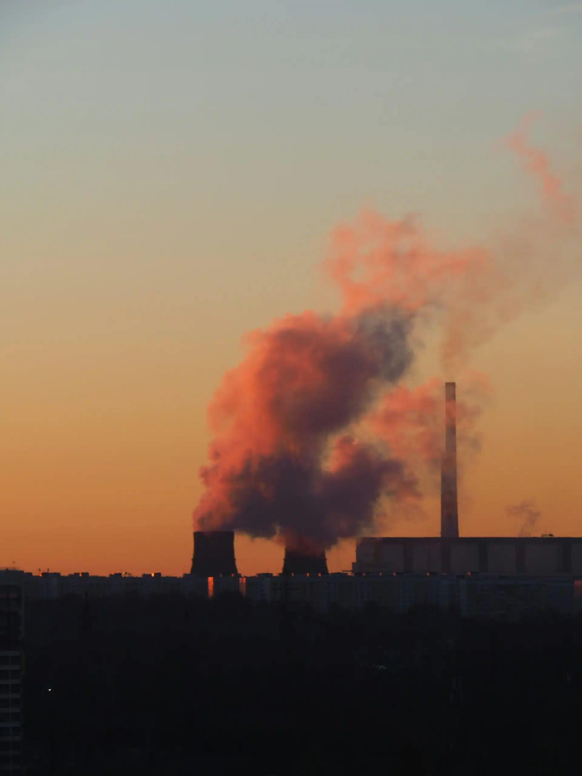 factory with orange smoke
