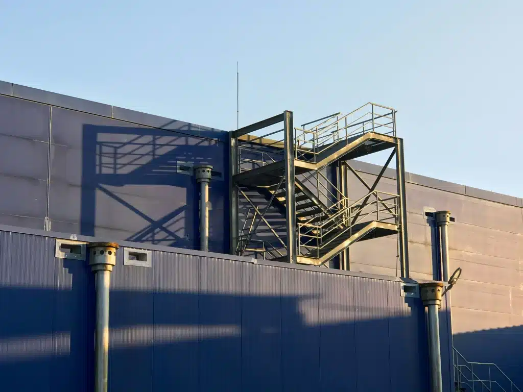 blue factory with blue sky in background