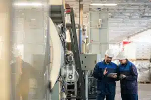 people talking in factory
