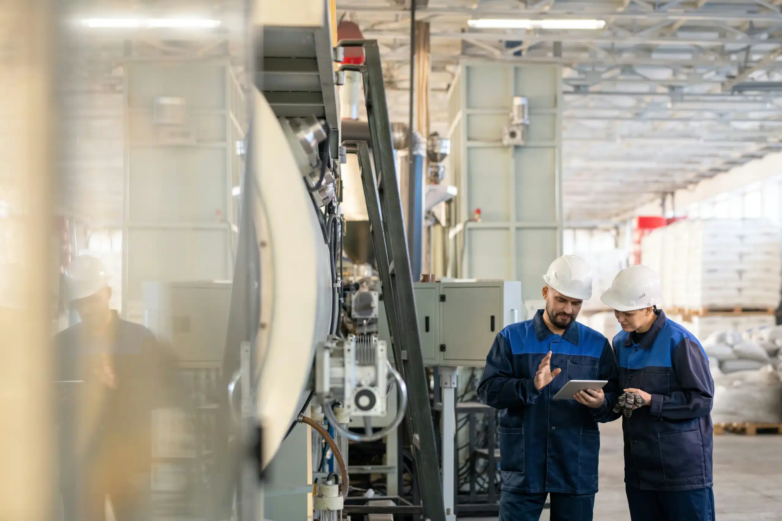 people talking in factory